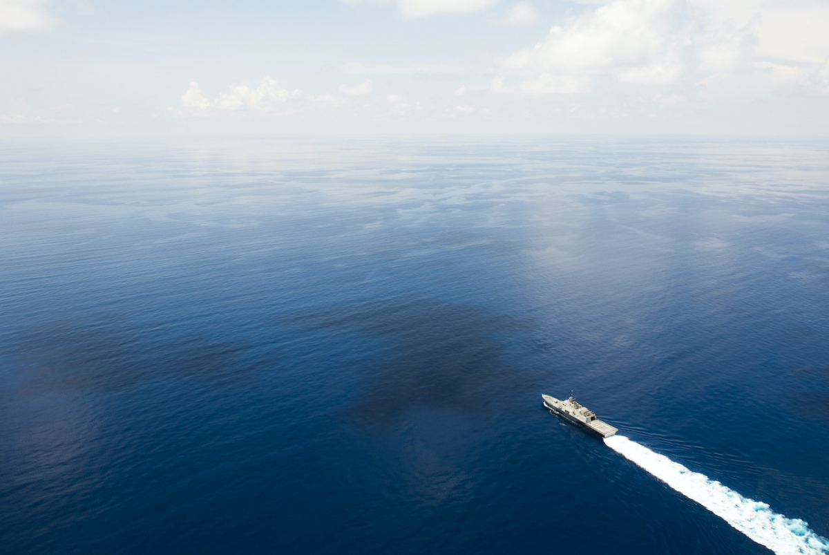 SOUTH CHINA SEA (May 11, 2015) The littoral combat ship USS Fort Worth (LCS 3) conducts routine patrols in international waters of the South China Sea near the Spratly Islands as the People’s Liberation Army-Navy [PLA(N)] guided-missile frigate Yancheng (FFG 546) sails close behind. (U.S. Navy photo by Mass Communication Specialist 2nd Class Conor Minto/Released)